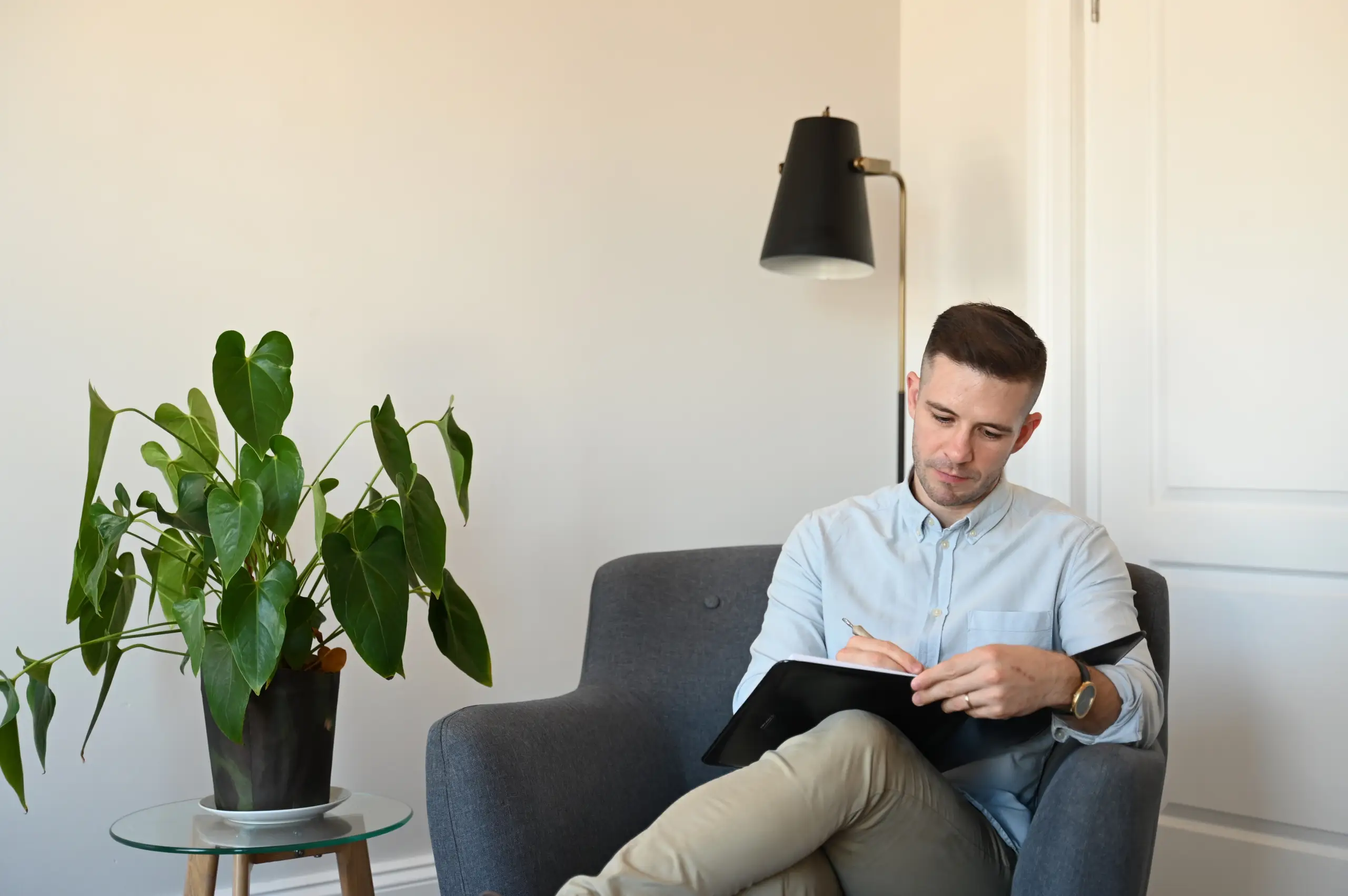 Indoor zen garden with smooth stones and greenery